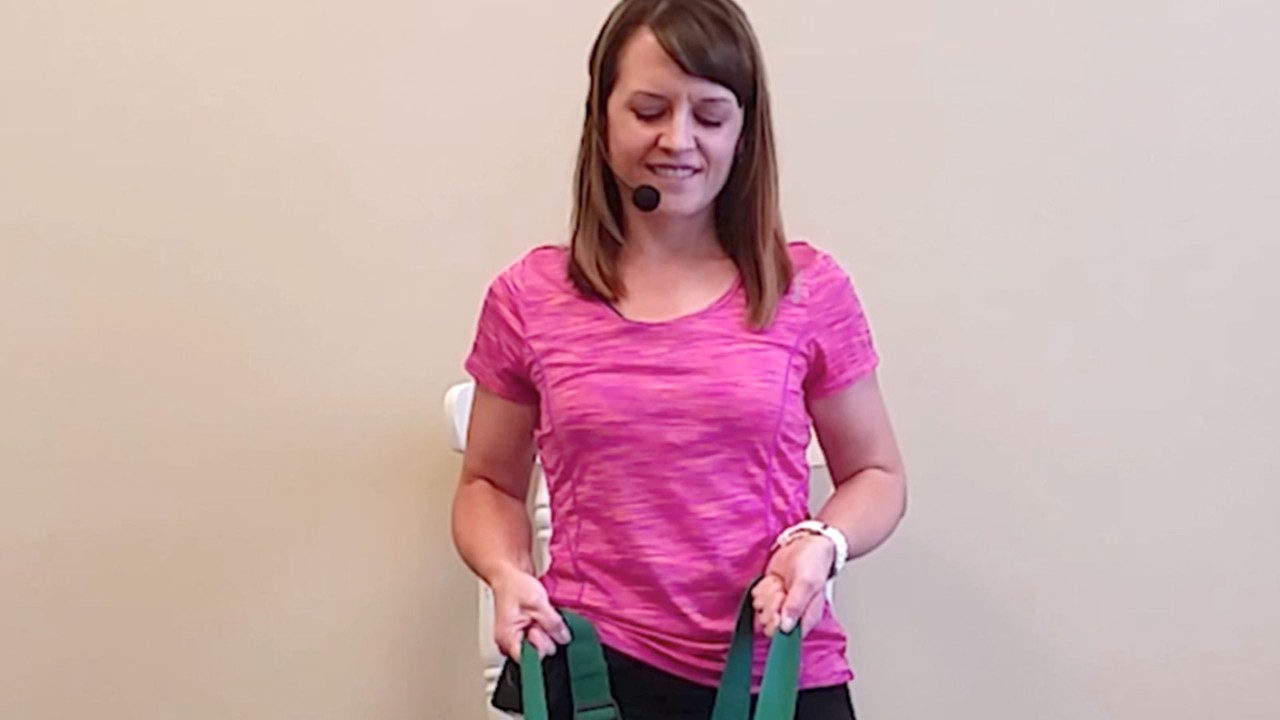 screenshot of woman demonstrating stretching exercises