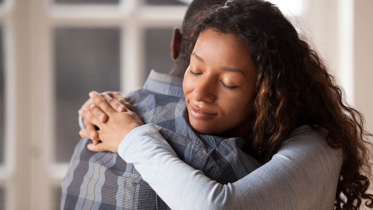 Man and woman hugging