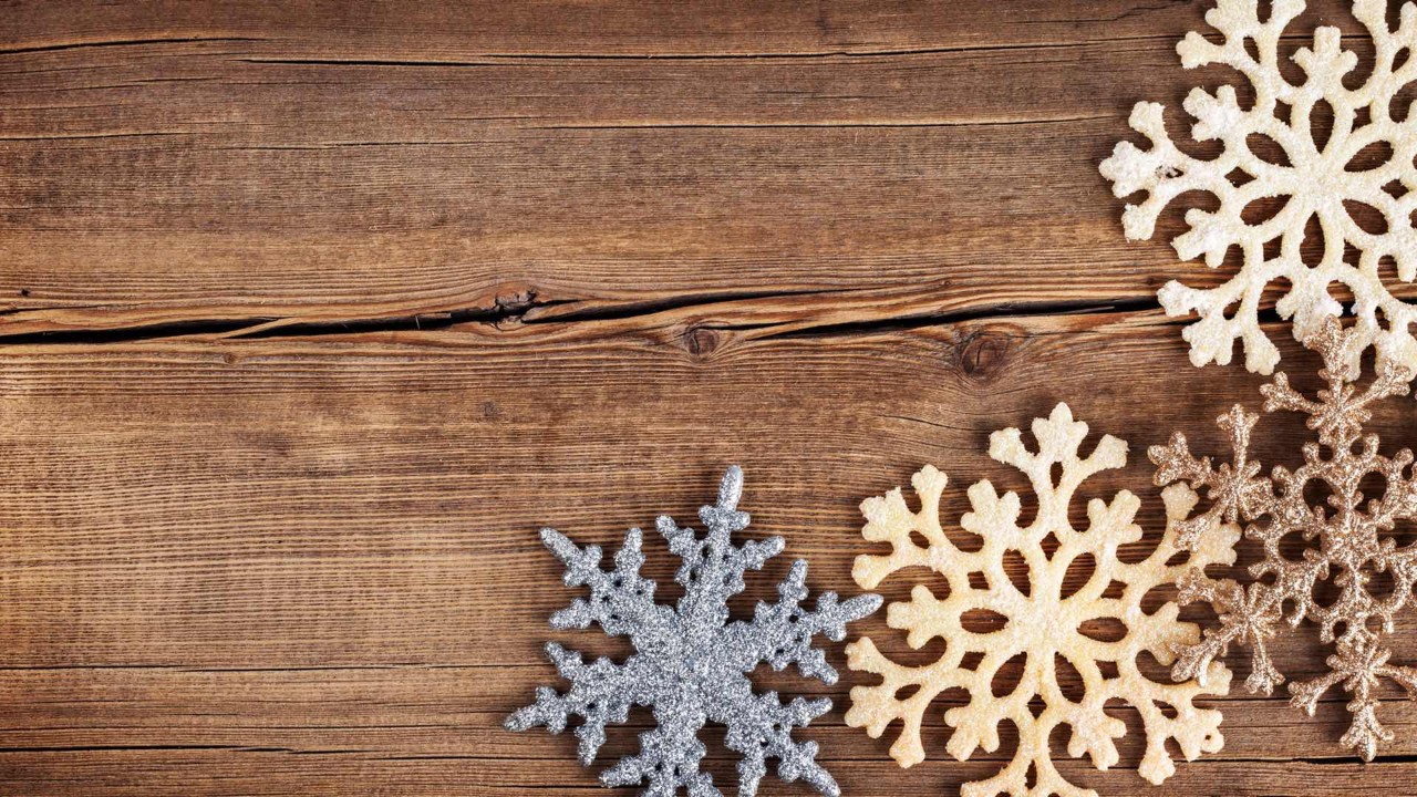 arts and crafts snowflakes on a table