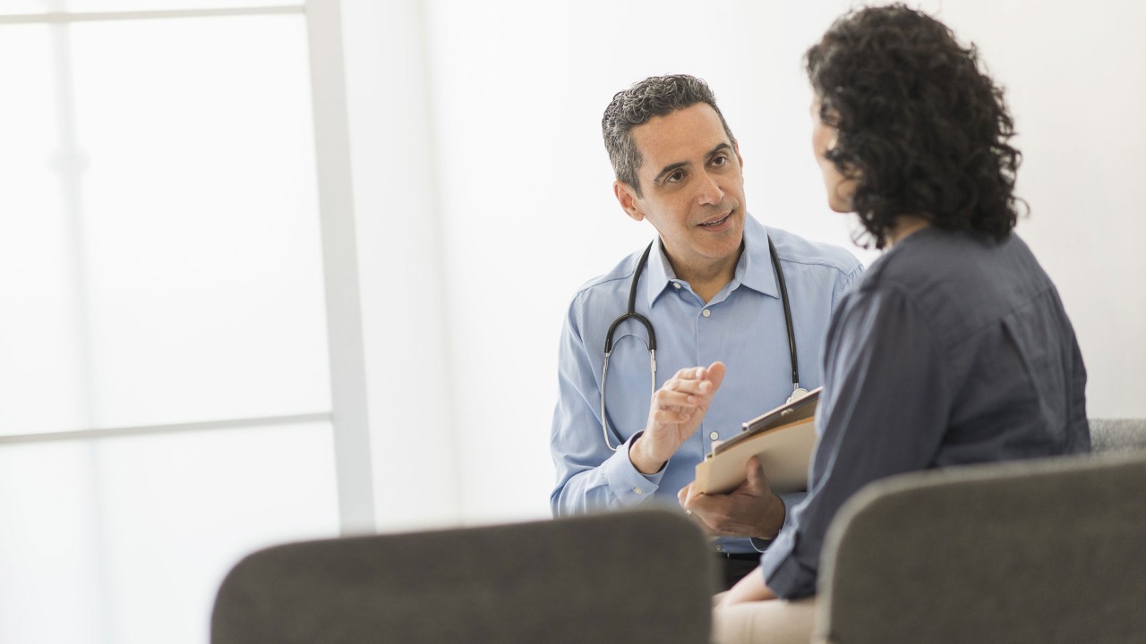 counselor and patient talking to each other